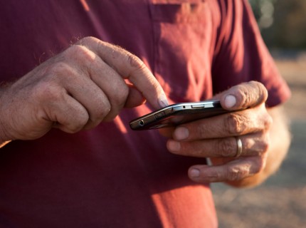 Farmer using smart phone