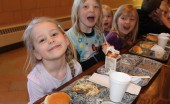 Sophia Taszarek, Isabelle Jones, and Addison Rolof smile at the lunch table at Kulm Public School. Photo by Sarah Gackle. Sophia Taszarek, Isabelle Jones, and Addison Rolof smile at the lunch table at Kulm Public School. Photo by Sarah Gackle.