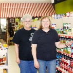 Lake Grocery manager Deb Holmstrom, right, and employee Dede Dylla are pictured next to the canned food section. The store has been under the ownership of Willow Lake Area Advancement for three years.