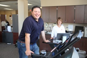 The Marshall County Healthcare Center uses the latest exercise technology for cardiac rehab but also to promote wellness. Picture here are Nick Fosness with Allison Tank, RN and cardiac rehab director. Photo by Doug Card