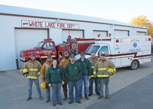 Pictured are local emergency responders (left to right) Left to right: Scott Moeller, John Falk, Dixie Falk, Jason Moeller, Doering, Dale Steffen, Tad McCord and Paul Assmas. 