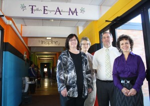 Members of the White Lake teaching staff gather in the breezeway that connects the elementary classrooms to the two-story schoolhouse. Superintendent Bob Schroeder (pictured with, left to right, Sandy Nightingale, Marcia Schuldt and Paulena Hanten) said that corridor is one of many catalysts for a new building project, because its design and access to the school’s backyard community daycare have created a vulnerability for students and staff.