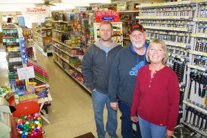 Tyler Wilson (left) works with his parents, Larry and Ronda Wilson, at Wilson True Value and is expected to eventually take over the family store.