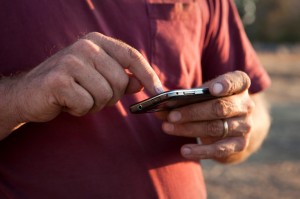 Farmer using smart phone