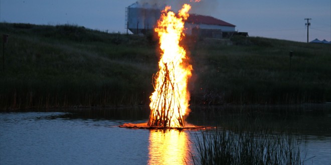 The juhannuskokko, or midsummer bonfire, burned brightly on the Maple River in Frederick. The bonfire is a midsummer tradition in Finland and now in Frederick. Photo courtesy fredericksd.com