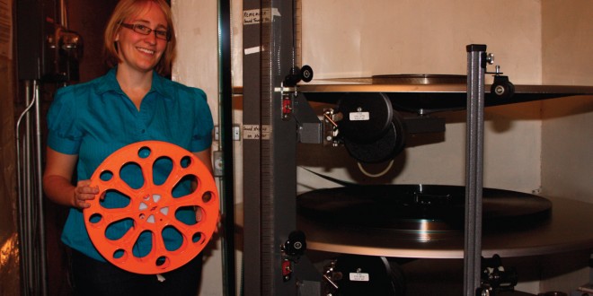 The reel that Jen Carstensen is holding is how new movies come to the Bryant Cinema. Clark County Courier photo