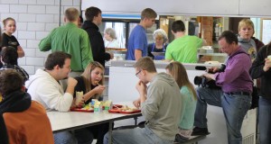 Kyle Ortmeier with other FHS students Allie Lowinske, Dade Monroe and Kaitlin Heitmann are filmed having lunch at Faulkton High School. Photo by Faulk County Record