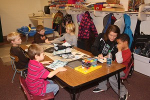 Activities that are fun as well as educational are offered at Clark’s after-school program. Here, paraprofessional Lori Bjerke assists Gabe Ashley with an art project. From left to right clockwise around the table are Corbin Wagner, Lincoln Reidburn, Connor Mudgett, Jada Wagner, Bjerke and Ashley. Photo by Clark County Courier