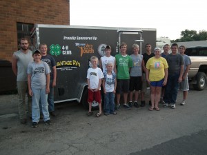 From left, Evan Ogren, Trey Jensen, James Erickson, Kade Larson, Alyssa Olson, Tate Jensen, Brent Ogren, Joshua Punt, Zachary Punt, Amber Ogren, Chase Larson, Ryan Punt, and Brian Anderson help with Langford’s recycling trailer. All of these kids, except Evan and Brian, are Dakota Kids 4-H Club members. Photo courtesy Dakota Kids 4-H Club