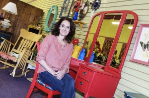 Kelsey Waletich upcycles furniture at her business, The Painted Past. Photo by Troy McQuillen