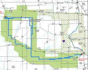 The blue line shows the proposed route options for the new transmission line. The green areas show those still under consideration, while the green hashed areas show routes no longer being considered for the line. Image from www.bssetransmissionline.com