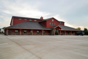 The North Central Farmers Elevator building in Ipswich, built by Quest Construction of Aberdeen, was designed with some key people in mind – area farmers, whose loyalty helped the company become the success it is today. “We are owned by and serve ag producers, so the building needed to look like the kind of business we do,” said Deanne Hoyle, human resources manager at North Central Farmers Elevator. “We wanted it to be welcoming, as well as open and spacious for our farmer-owners, because it is their building.” The building features board siding and the lines of the exterior are reminiscent of large barns that grace farmsteads in the area. Courtesy photo