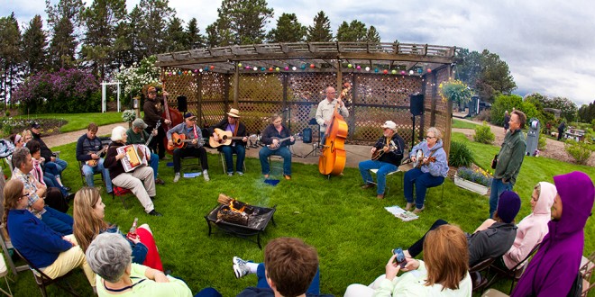 The Rural Art and Culture Summit in Morris, Minn., in June drew people from all over the region to discuss how the arts could be leveraged to create vibrant communities. One evening gathering took place outside, despite cool June temperatures. Photo by Holly Diestler