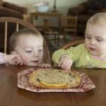 Elle Waldoch and Lucy Bartholomew are working on starting their own childhood memories of kuchen. The two girls are granddaughters of Sue Balcom of Mandan, N.D.