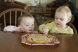 Elle Waldoch and Lucy Bartholomew are working on starting their own childhood memories of kuchen. The two girls are granddaughters of Sue Balcom of Mandan, N.D.