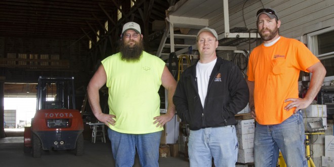 Chad Hardy, center, owns the Langford Lumber Company. Russell Crosby, left, works at the lumber yard, and Joe Keogh is a regular customer at the lumber yard through his work as assistant city manager. Photo by Troy McQuillen