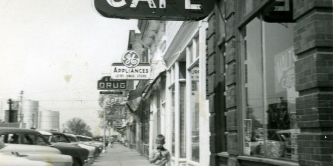 Alan under Walt’s cafe sign