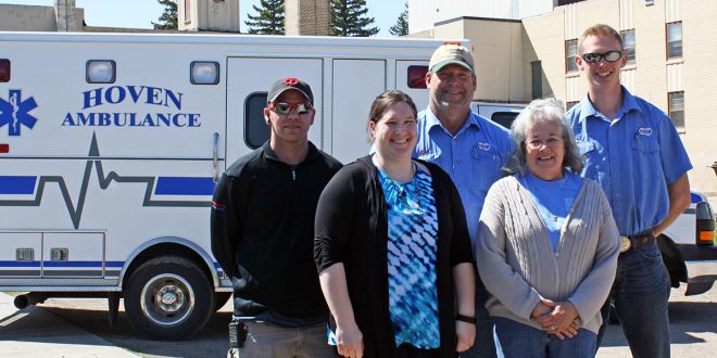 Quality emergency care has become even more critical in Hoven, S.D., than it once was, since the 2010 closure of Holy Infant Hospital (in the background). The city council’s progressive emergency services program has kept the town that now is 25 miles from the nearest hospital alive with emergency medical technicians, emergency vehicle operators, and now paramedics. Paramedic Brady Hartung, EMT Kurt Rausch, EMT Blair Ruckman, Paramedic Jill Cody, and EMT Anna Marshall all are members of the Hoven Ambulance crew.
